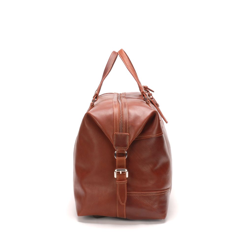 Large travel bag in dipped leather