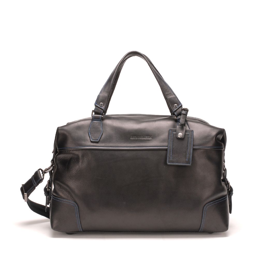 Large travel bag in dipped leather