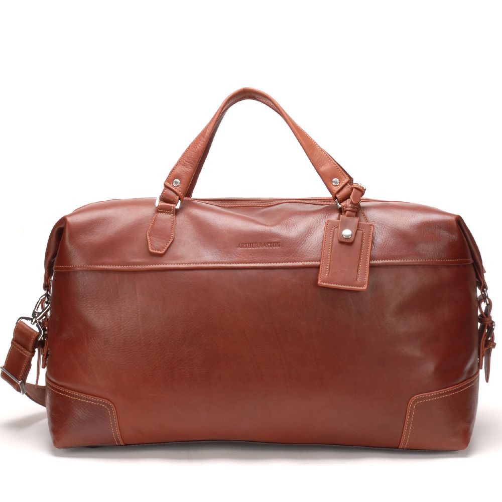 Large travel bag in dipped leather 