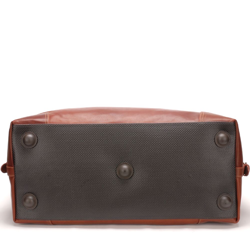 Large travel bag in dipped leather 