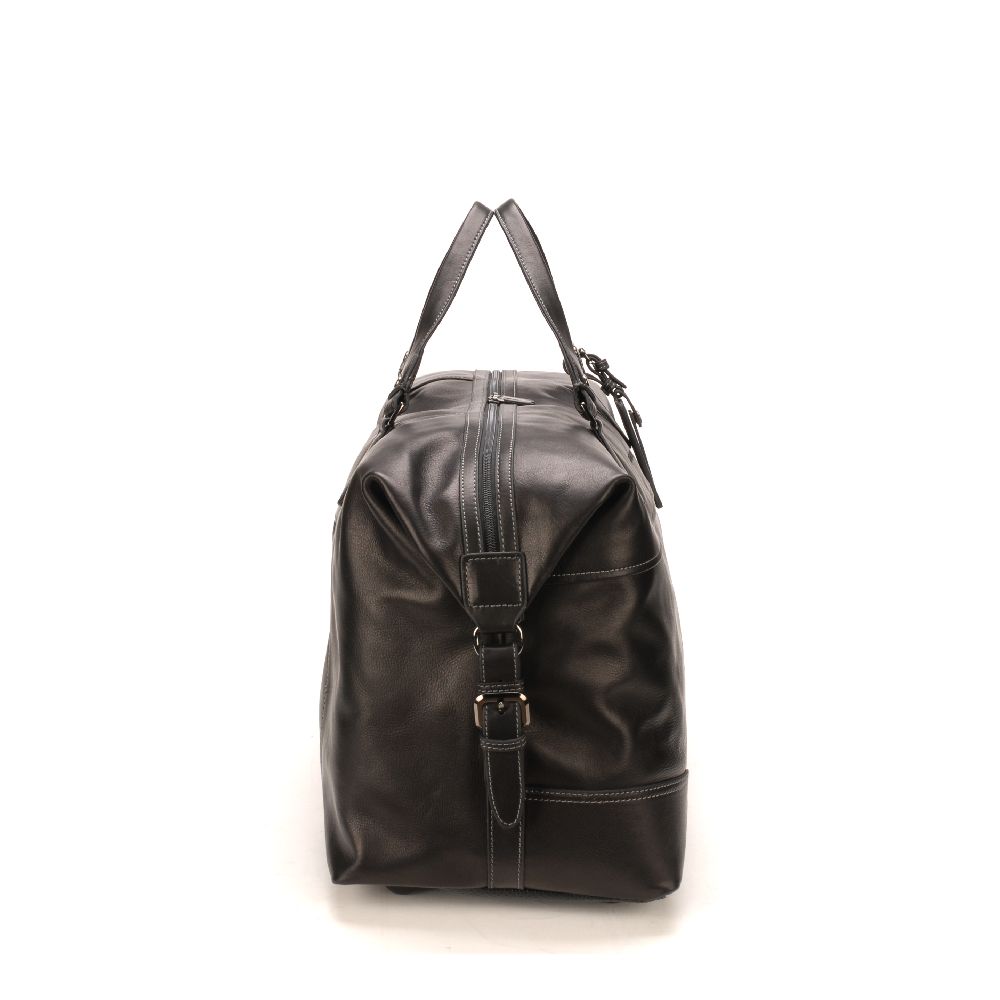 Large travel bag in dipped leather 