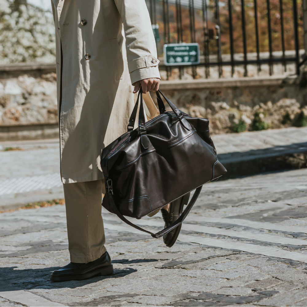 Large travel bag in dipped leather 